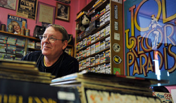 Joe Lee, 62, a regular pot smoker, runs a vintage-record shop in Rockville. He says he has noticed more public acceptance of the drug than when he used it while an art student in Baltimore in the 1960s. (Photo by Bill O'leary)